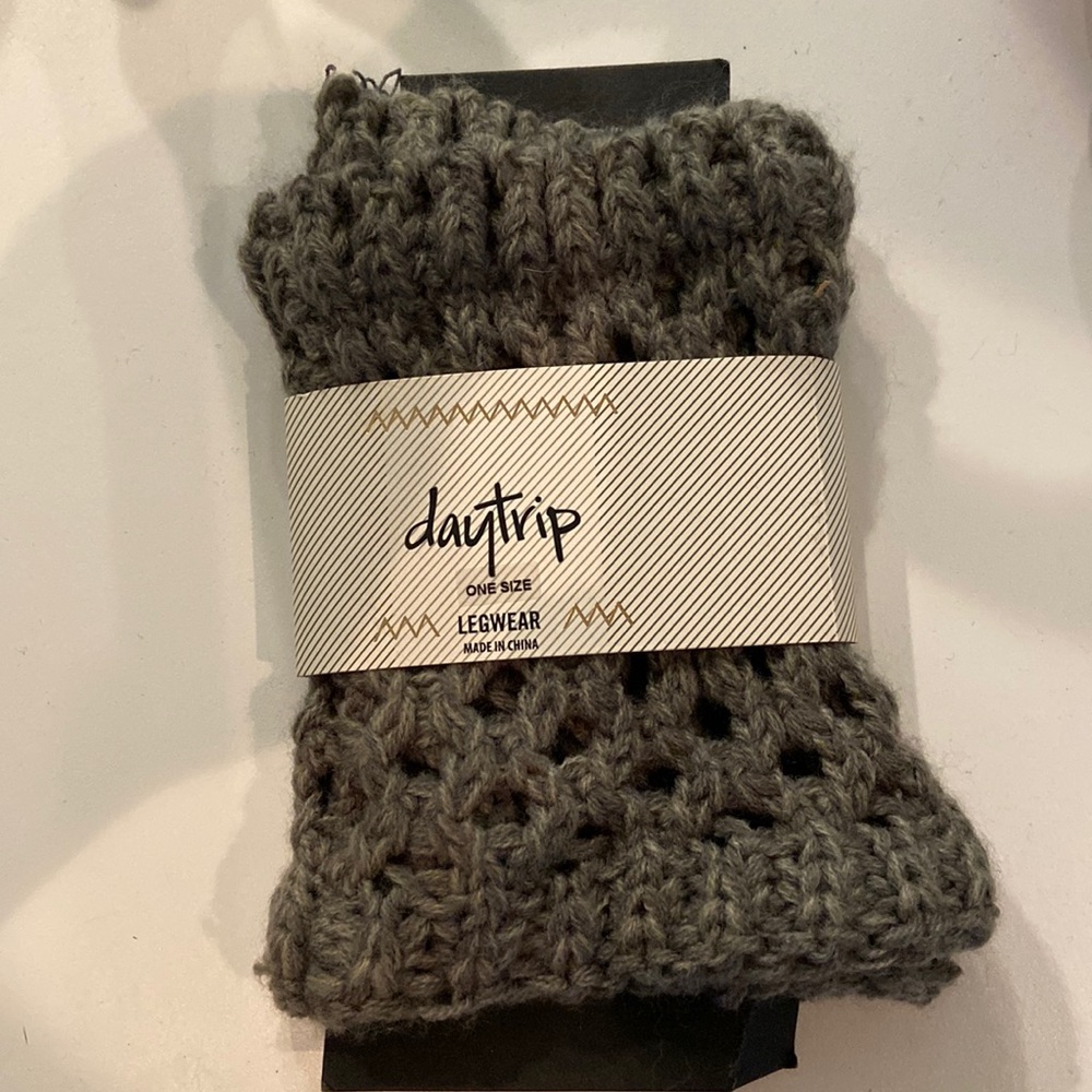 Buckle daytrip boot cuffs. Knitted. Never worn. One size.